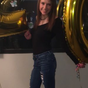 Black off-the-shoulder long-sleeve shirt